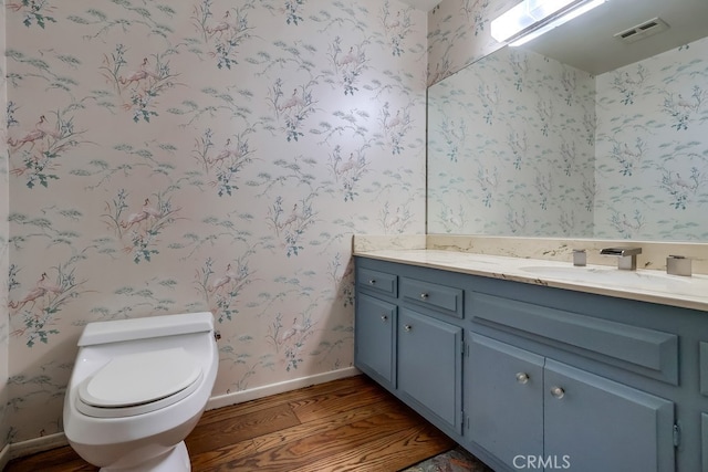 2229 Via Cerritos, Palos Verdes Estates, CA 90274 - bathroom featuring visible vents, wallpapered walls, vanity, and wood finished floors