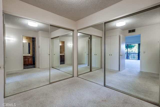 closet featuring visible vents