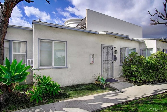 view of front of home with stucco siding