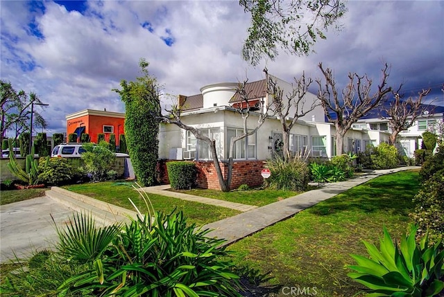 exterior space with a yard
