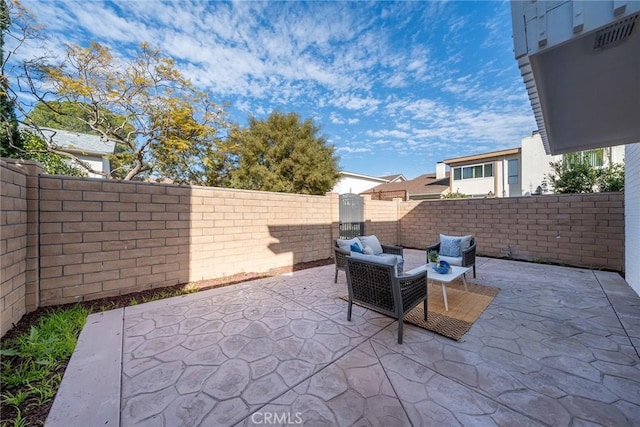 view of patio with a fenced backyard