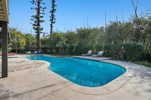 pool with a patio