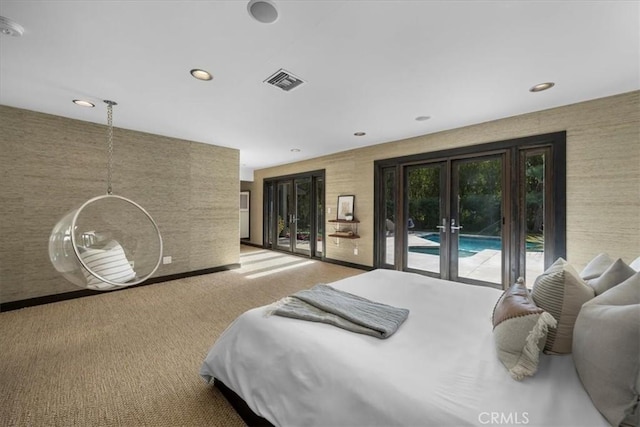 bedroom featuring recessed lighting, light colored carpet, visible vents, access to exterior, and french doors