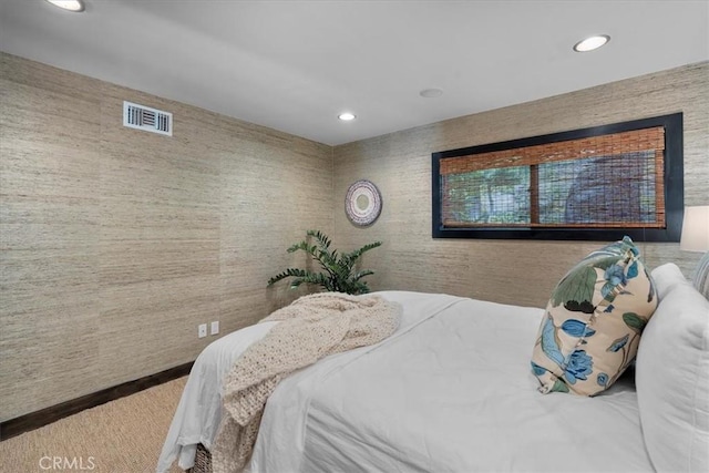 bedroom with visible vents and recessed lighting