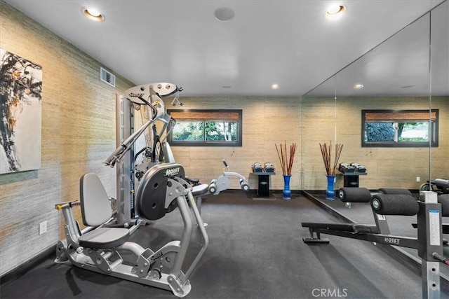 exercise area featuring visible vents and recessed lighting