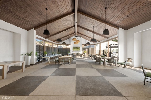 view of patio with ceiling fan, fence, and outdoor dining area