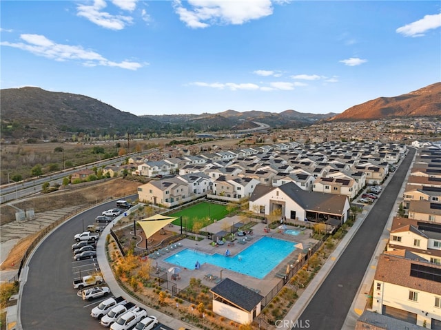 view of pool featuring a residential view and a mountain view