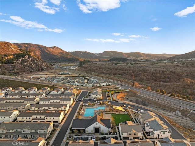 drone / aerial view with a residential view and a mountain view