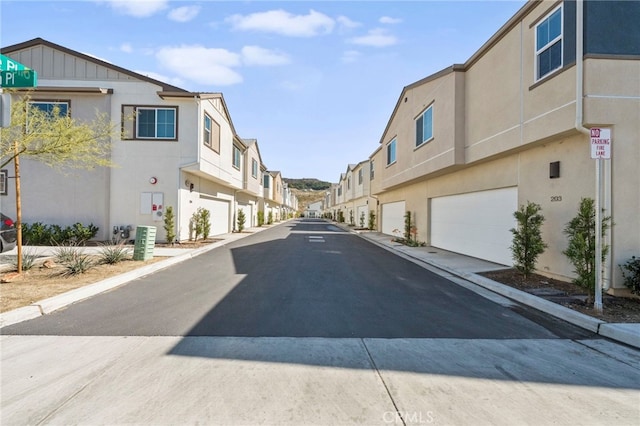 view of road with a residential view