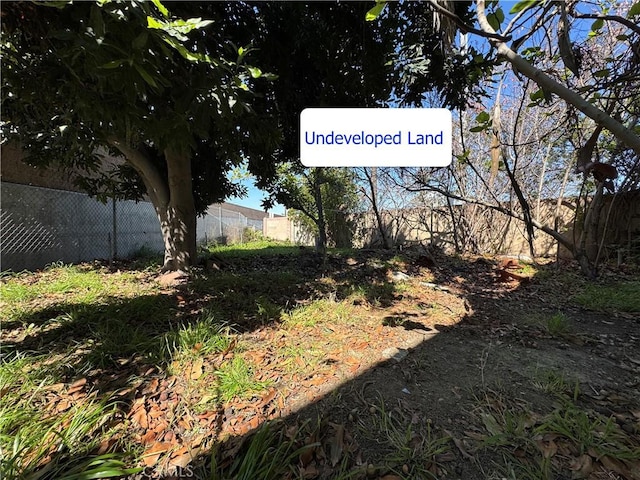7736 Sugar Dr, Huntington Beach, CA 92647 - view of yard featuring fence