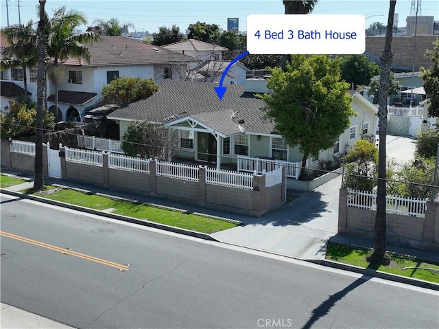 7736 Sugar Dr, Huntington Beach, CA 92647 - exterior space with a fenced front yard