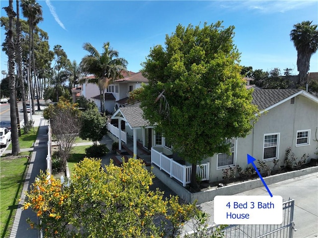 7736 Sugar Dr, Huntington Beach, CA 92647 - exterior space featuring a residential view and stucco siding