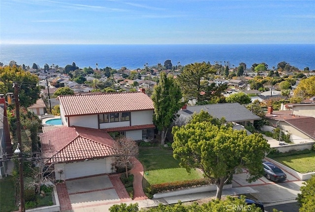 drone / aerial view with a water view