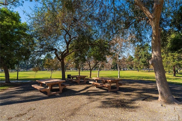 view of home's community with a lawn