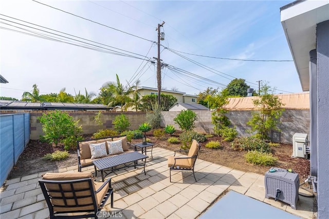 view of patio / terrace with outdoor lounge area and a fenced backyard