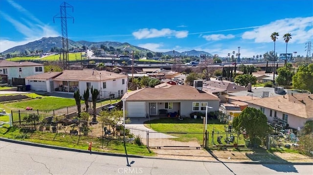 exterior space featuring a residential view and a mountain view