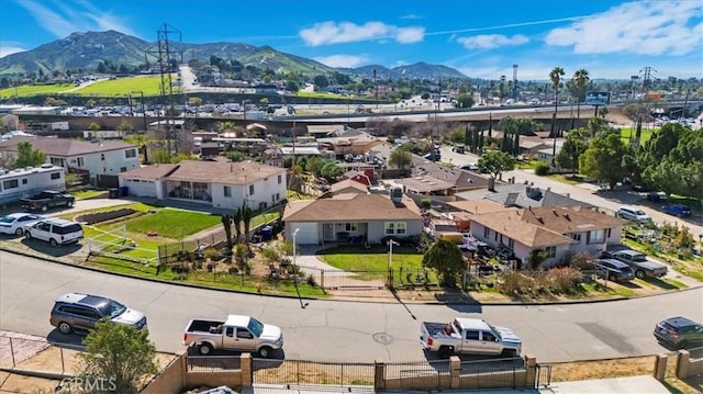 birds eye view of property featuring a residential view and a mountain view