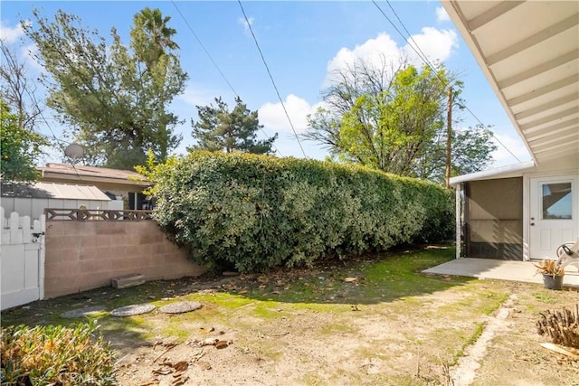 view of yard with fence