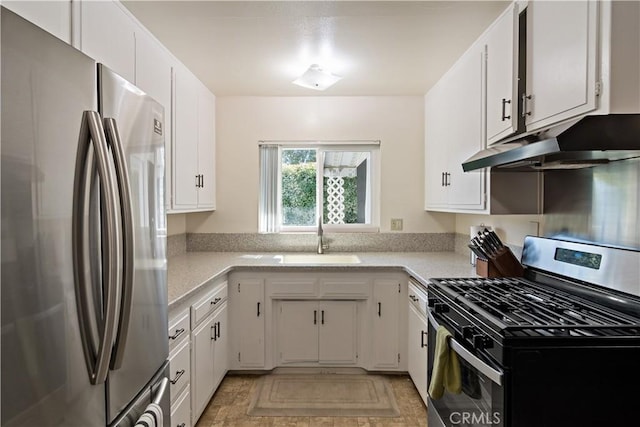 kitchen featuring a sink, under cabinet range hood, light countertops, white cabinets, and appliances with stainless steel finishes