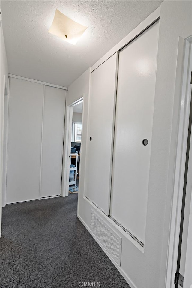 closet featuring visible vents
