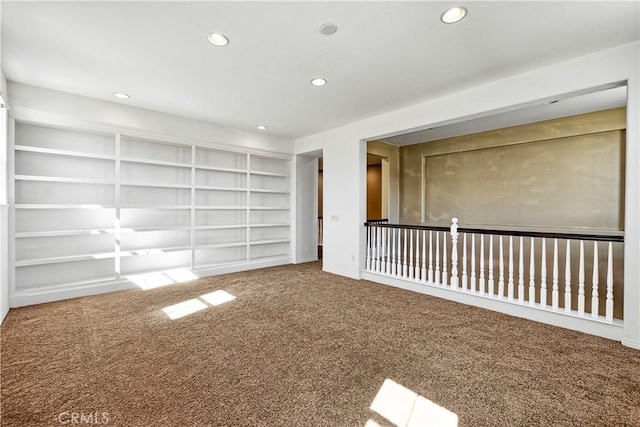 empty room featuring recessed lighting and carpet flooring