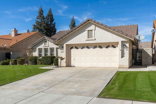 view of front of house featuring a garage, concrete driveway, a gate, stucco siding, and a front lawn