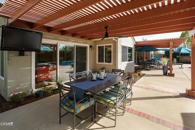 view of patio with outdoor dining area and a pergola