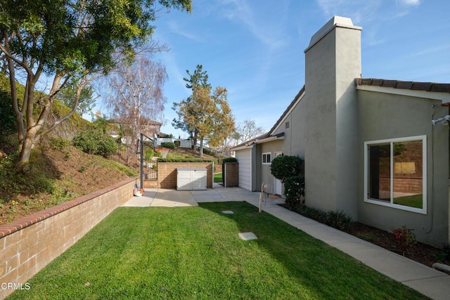 view of yard featuring a patio area and fence