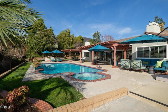 view of swimming pool with an outdoor hangout area, a patio, a pool with connected hot tub, and a pergola