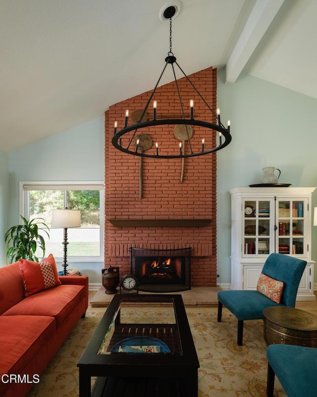 living area featuring a fireplace, vaulted ceiling with beams, and baseboards