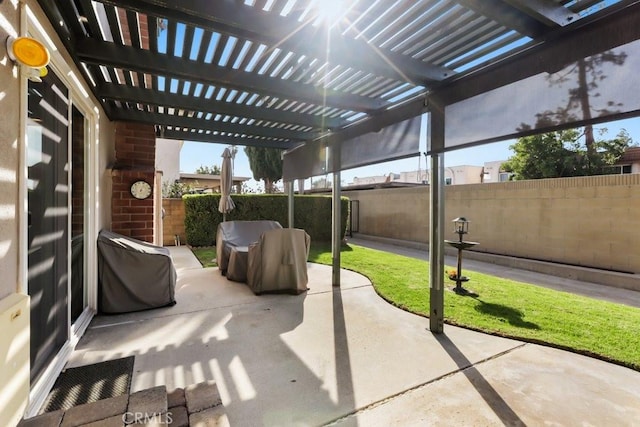 view of patio featuring a fenced backyard and a pergola