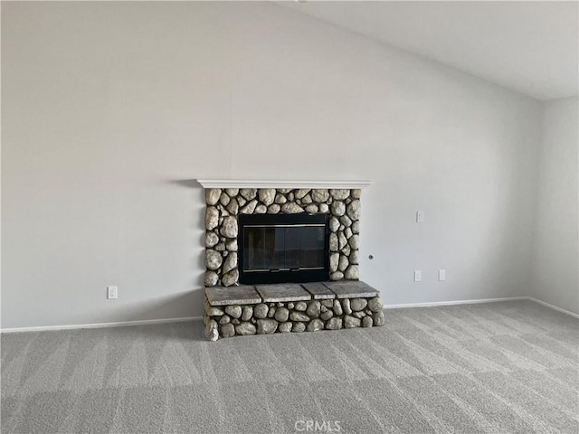 interior details with carpet floors, a fireplace, and baseboards