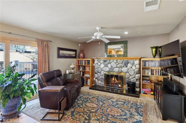 5020 Solitude Ct, Rancho Cucamonga, CA 91737 - living area featuring a fireplace, ceiling fan, and recessed lighting