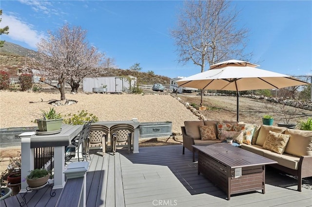 5020 Solitude Ct, Rancho Cucamonga, CA 91737 - wooden terrace featuring an outdoor living space and a mountain view