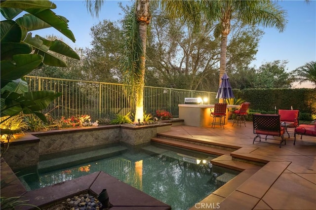 view of pool with a patio area, a fenced backyard, and a fenced in pool