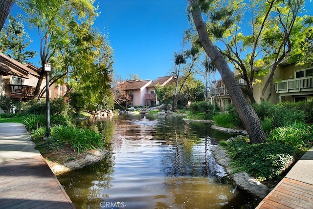 exterior space with a water view