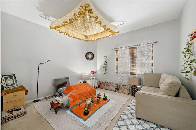 playroom featuring light carpet and baseboards