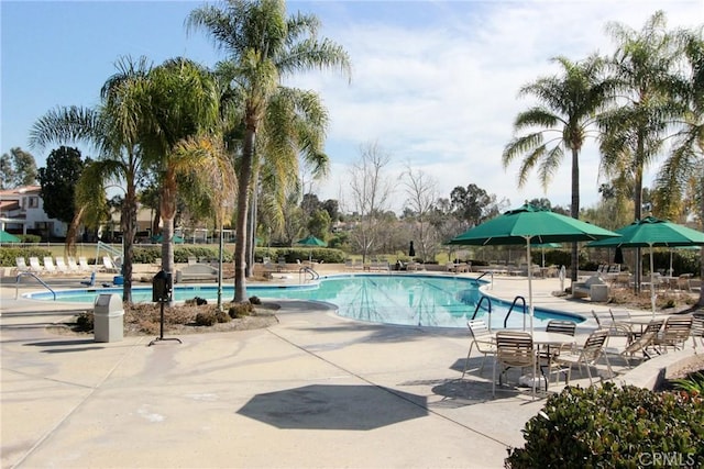 pool featuring a patio area