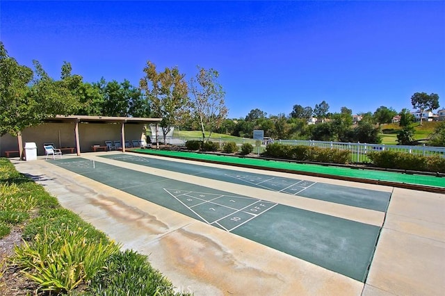 view of home's community with shuffleboard