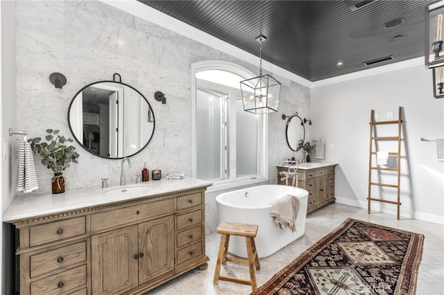 bathroom featuring visible vents, two vanities, a sink, and ornamental molding