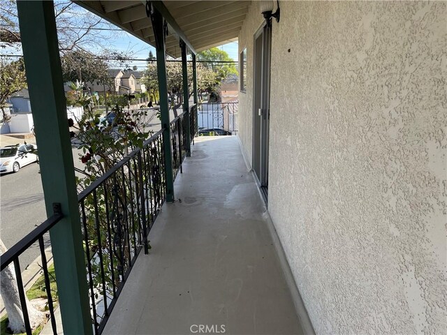 balcony featuring a porch