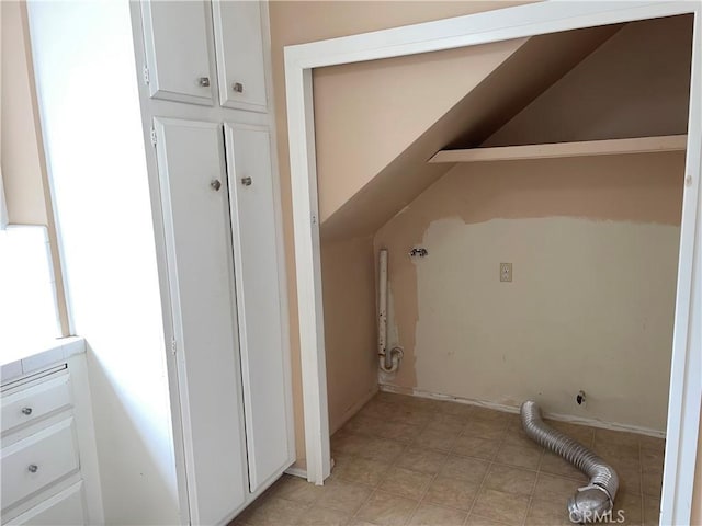 laundry area with hookup for an electric dryer and laundry area