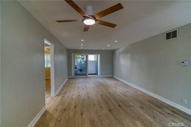 unfurnished room with recessed lighting, visible vents, light wood-style floors, ceiling fan, and baseboards