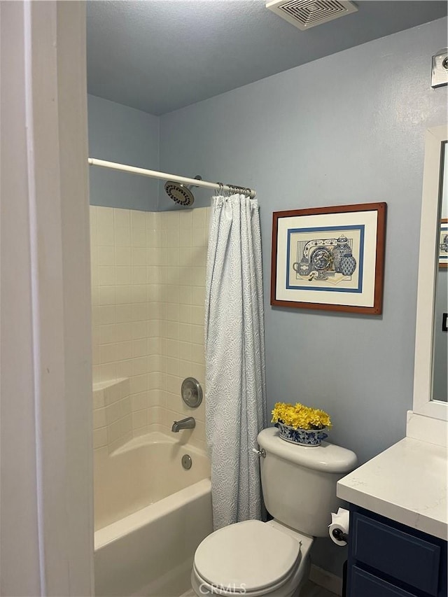 bathroom featuring toilet, shower / bath combo, visible vents, and vanity