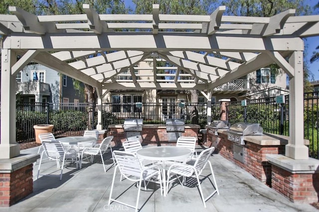 264 Blue Sky Dr, Tustin, CA 92782 - view of patio featuring a pergola, grilling area, outdoor dining space, and an outdoor kitchen
