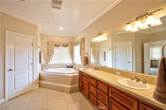 bathroom with crown molding, double vanity, a sink, and tile patterned floors