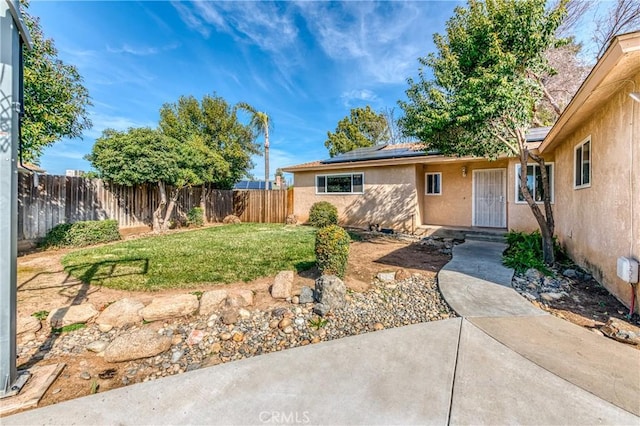 view of yard featuring a fenced backyard and a patio