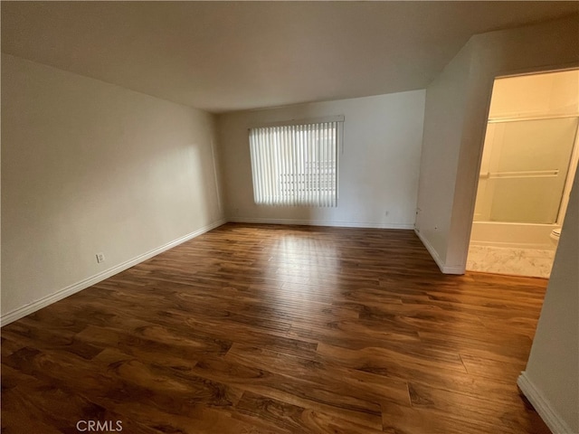 10115 Pinewood Ave Unit 102, Tujunga, CA 91042 - empty room with wood finished floors and baseboards