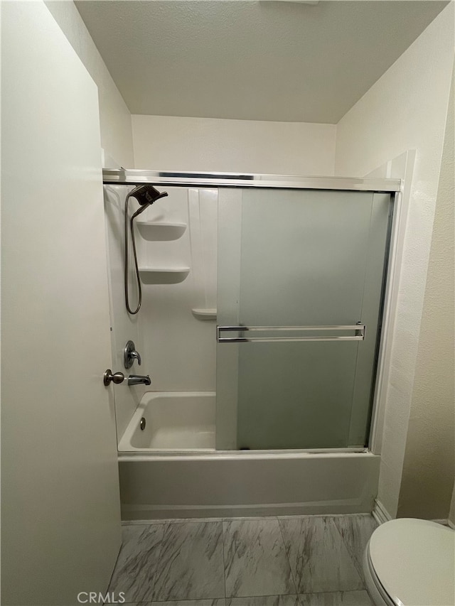 10115 Pinewood Ave Unit 102, Tujunga, CA 91042 - full bath featuring marble look tile flooring and enclosed tub / shower combo