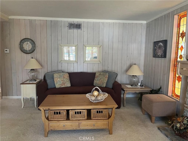 living area with light colored carpet, crown molding, and visible vents